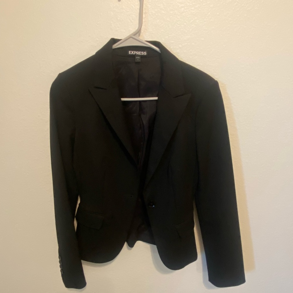 Woman’s suit jacket size 2